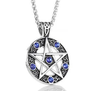 Close-up of vintage silver pentagram pendant with blue rhinestones and Celtic patterns