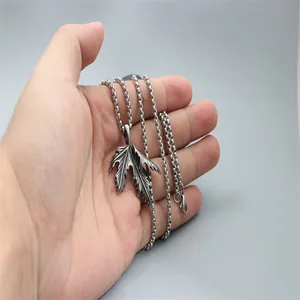 Leaf pendant necklace with realistic maple texture on a vintage box chain for men and women