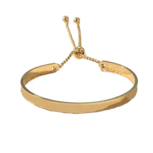 Adjustable golden stainless steel script bangle with delicate pull chain and metal beads