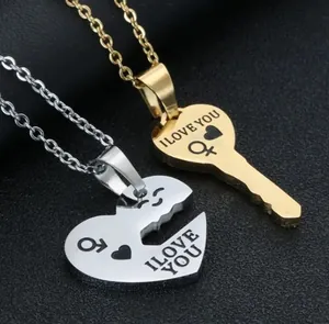 Macro shot of stainless steel puzzle necklace set with key and heart pendants