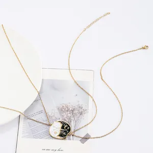 Golden stainless steel sun and moon cat necklace with ying-yang pendant in gift tray