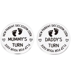 New parent decision coin in stainless steel featuring mummy and daddy turn engraving