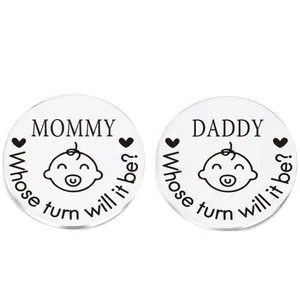 Macro detail of silver stainless steel decision coins for Mommy and Daddy parenting tasks