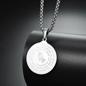 Detailed engraving of Praying Hands and Serenity Prayer on stainless steel pendant