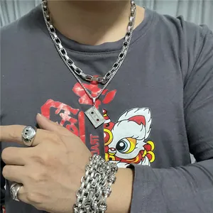 Conjunto de joyas punk de acero titanio con collar de casete y anillo de sonrisa