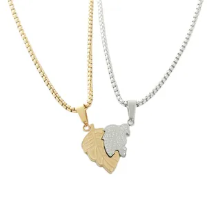 Matching gold and silver leaf heart pendant necklaces in stainless steel for couples