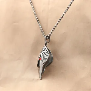 Retro eagle claw pendant in stainless steel with red gemstone on a box chain