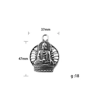Vintage stainless steel Buddha pendant with sunburst texture and lotus base on white background