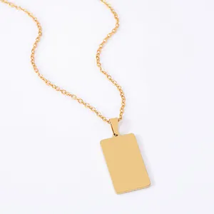 Polished gold rectangular stainless steel pendant necklace on a minimalist link chain