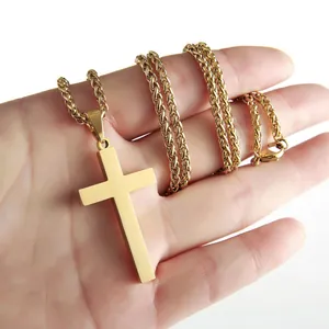 Croix en acier inoxydable doré poli avec chaîne blé sur une paume pour les dimensions