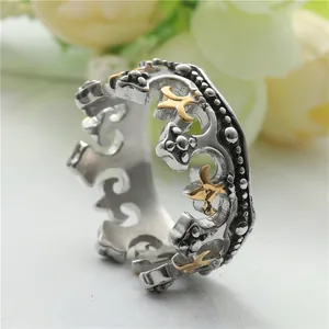 Vintage stainless steel crown ring with golden star detail and hollow punk design