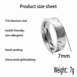 Macro detail of ruler scale and animal footprint engraving on titanium steel ring