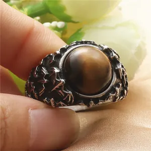 Vintage bat ring in antique silver finish with brown cat-eye gemstone and gothic carvings