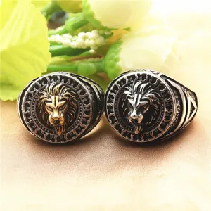 Macro detail of retro lion head rings in gold and silver finish with antique texture