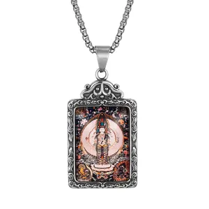 Detailed relief of vintage silver guardian buddha pendant with intricate cloud patterns