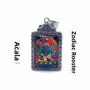 Macro view of Acala Buddha titanium steel pendant with decorative engraved cloud patterns