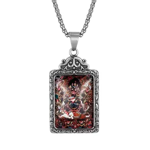 Detailed relief engraving on vintage Mahakala deity pendant in stainless steel