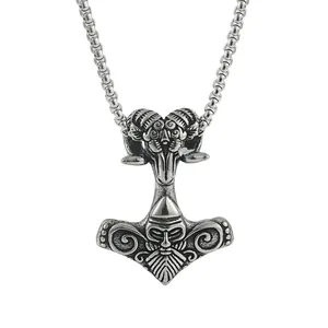 Viking Thor's Hammer Mjolnir necklace with ram head and bearded face carvings in steel