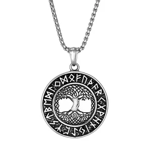 Detail of vintage silver life tree pendant featuring Nordic runes on a box chain