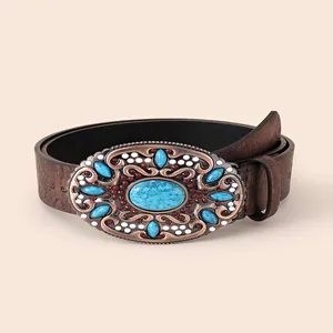 Vintage bohemian faux leather belt with turquoise buckle and floral embossing