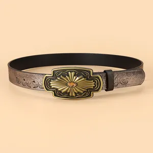 Vintage embossed leather belt with ornate bronze buckle and amber gemstone inlay