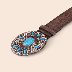 Vintage PU leather belt with bohemian turquoise metal buckle and embossed floral patterns