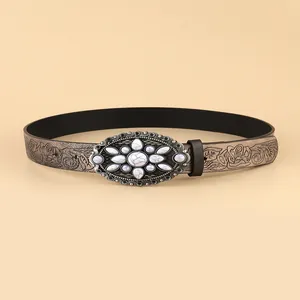 Retro bohemian waist belt with white stone buckle and floral embossed metallic finish
