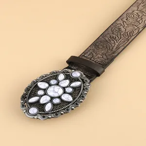 Western vintage belt with oval silver buckle, white marble stone and floral embossed leather