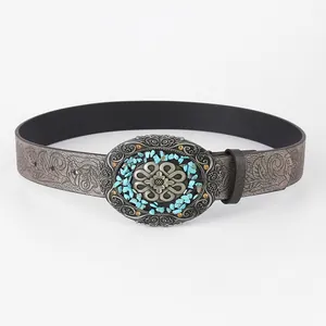 Bohemian retro faux leather belt with embossed floral pattern and turquoise metal buckle