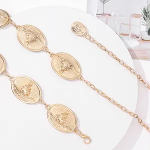 Bohemian gold metal waist chain featuring embossed bull head pendants and lobster clasp
