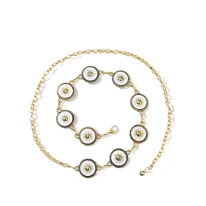 Vintage golden sun medallion waist chain with white enamel and lobster clasp