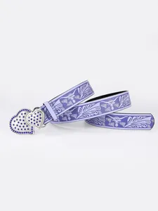 Detail of western style lavender belt with double heart buckle and blue rhinestones