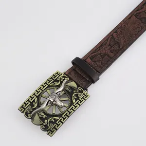 Western style belt with carved bull head buckle and embossed brown leather texture