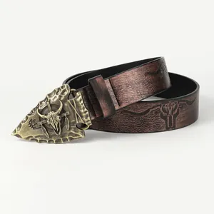 Western style belt with vintage bull head buckle and tribal embossed leather strap