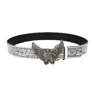 Cintura con fibbia aquila e goffratura floreale vintage su pelle bianca e argento