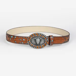 Vintage western belt featuring brown embossed leather and bull head silver buckle decoration