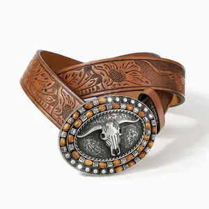Vintage western cow skull belt with floral embossed brown leather and rhinestone buckle