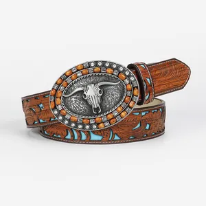 Western style brown leather belt with floral embossing and longhorn bull skull buckle