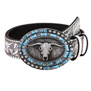 Vintage western belt with turquoise bull head buckle and floral embossed leather strap