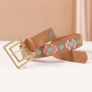 Vintage embroidered belt with geometric pattern and large gold buckle for women