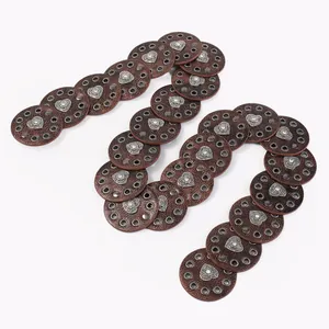 Western style belt with vintage brown leather conchos featuring heart metal details