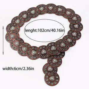 Detailed size view of western style belt with hollow circles and heart metal studs