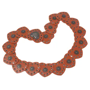 Vintage western heart-shaped leather belt with silver star studs and embossed buckle