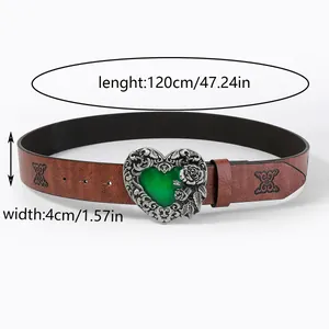 Detail of vintage belt with green heart buckle and floral engraving, 120cm length