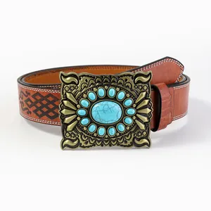 Vintage western cowboy belt with embossed brown leather and blue turquoise buckle