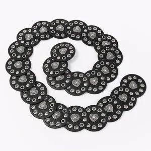 Western cowboy style belt with hollow circular patches and silver heart rivets