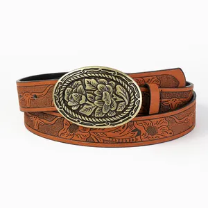 Vintage Western Ledergürtel in Braun mit Prägung und bronzener Stierschnalle