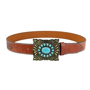 Brown vintage western cowboy belt with embossed floral buckle and turquoise accents