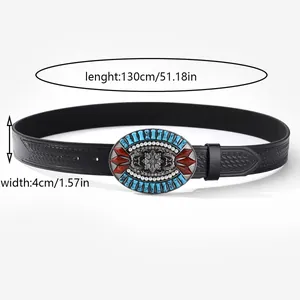 Detail of bohemian embossed leather belt with turquoise buckle, 130cm length by 4cm width