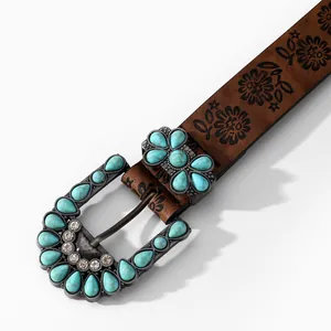 Bohemian brown leather belt with floral embossing and turquoise gemstone buckle
